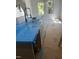 New kitchen island with modern faucet, countertops protected by wrap at 123-125 Ottawa Dr., Louisburg, NC 27549