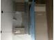 Kitchen featuring gray backsplash, light gray cabinets, and modern lighting at 123-125 Ottawa Dr., Louisburg, NC 27549