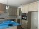 Beautiful kitchen featuring custom cabinetry, stainless steel appliances, and modern recessed lighting at 123-125 Ottawa Dr., Louisburg, NC 27549