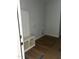 Mudroom featuring built-in bench, hooks, and shelving for organization at 123-125 Ottawa Dr., Louisburg, NC 27549