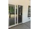 Covered patio with sliding glass door, providing easy access to indoor/outdoor living at 123-125 Ottawa Dr., Louisburg, NC 27549
