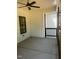 Covered porch with ceiling fan, offering a relaxing outdoor space at 123-125 Ottawa Dr., Louisburg, NC 27549