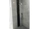 Walk-in shower with modern gray and black tiles and sleek fixtures at 123-125 Ottawa Dr., Louisburg, NC 27549