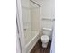 Bathroom with a tub and toilet at 1321 Crab Orchard Drive # 203, Raleigh, NC 27606