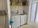 Laundry room with a washer and dryer and white walls at 1321 Crab Orchard Drive # 203, Raleigh, NC 27606