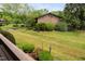 Scenic shot of the landscaped grounds, highlighting the lawn, shrubs, and lush green setting of the property at 1504 Oak Tree Dr, Chapel Hill, NC 27517