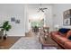 Spacious living room with hardwood flooring and open sightlines to the dining room and kitchen at 1504 Oak Tree Dr, Chapel Hill, NC 27517
