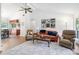 Inviting living room boasts high ceilings, hardwood floors, and views into the dining and kitchen areas at 1504 Oak Tree Dr, Chapel Hill, NC 27517