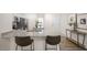 Bright kitchen features granite countertops, stainless steel appliances, and modern fixtures at 176 Holmes Corner Dr, Smithfield, NC 27577