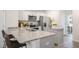 Modern kitchen featuring granite countertops, stainless steel appliances, and ample cabinet space at 176 Holmes Corner Dr, Smithfield, NC 27577