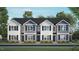 Beautiful new construction townhomes with charming curb appeal and traditional architectural details at 184 Holmes Corner Dr, Smithfield, NC 27577
