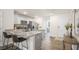 Modern kitchen with granite countertops, stainless steel appliances, and a spacious island at 184 Holmes Corner Dr, Smithfield, NC 27577