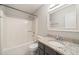 Full bathroom includes granite counters, a tub, shower combination, and vanity with storage at 1903 Malone Rd # E, Burlington, NC 27215