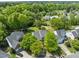 Scenic aerial view highlighting the community's landscaping, homes, and street layout at 1911 Housatonic Ct, Apex, NC 27523