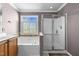 Bathroom featuring bathtub, walk-in shower, and vanity with sink at 1911 Housatonic Ct, Apex, NC 27523