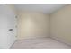 Neutral-toned bedroom featuring plush carpeting and closet storage at 1911 Housatonic Ct, Apex, NC 27523