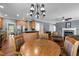 Open-concept layout connecting the kitchen, dining area, and living room at 1911 Housatonic Ct, Apex, NC 27523