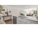 Stylish kitchen with granite countertops and stainless steel appliances, seamlessly connecting to the dining and living areas at 192 Holmes Corner Dr, Smithfield, NC 27577