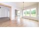 Bright dining room featuring outdoor access, wood floors and natural light, ideal for enjoying meals at 2 Deer Run Trl, Hillsborough, NC 27278