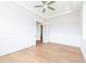 Bright office with hardwood floors and contemporary ceiling fan at 2 Deer Run Trl, Hillsborough, NC 27278
