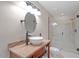 Bathroom featuring tile floors and a glass shower with a vessel sink and a marble countertop at 2008 Elizabeth Ct, Clayton, NC 27520