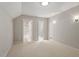 Neutral carpeted bedroom features recessed lighting and doorways to an adjacent room at 2008 Elizabeth Ct, Clayton, NC 27520