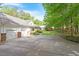 Spacious driveway with two-car garage and well-maintained landscaping at 2008 Elizabeth Ct, Clayton, NC 27520