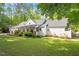 Charming single-Gathering home featuring a two-car garage and manicured lawn at 2008 Elizabeth Ct, Clayton, NC 27520