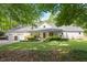 Charming single-Gathering home featuring a two-car garage and manicured lawn at 2008 Elizabeth Ct, Clayton, NC 27520