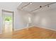 Bright living room with hardwood floors and track lighting at 2008 Elizabeth Ct, Clayton, NC 27520