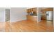 Spacious living room featuring hardwood floors and easy access to kitchen at 2008 Elizabeth Ct, Clayton, NC 27520