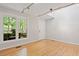 Bright living room with hardwood floors and track lighting at 2008 Elizabeth Ct, Clayton, NC 27520