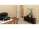 Comfortable office featuring a boat painting, neutral walls, and a wooden desk with space to work at 204 Highlands Lake Dr. Dr, Cary, NC 27518