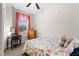 Cozy bedroom with warm light, natural light and a charming decor, provides relaxation at 212 Orange St, Oxford, NC 27565