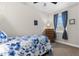 Comfortable bedroom features soft carpet, closet space and bright natural light from the window at 212 Orange St, Oxford, NC 27565