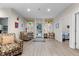 Inviting entryway with hardwood floors, natural light, and a clear view to the outside at 212 Orange St, Oxford, NC 27565