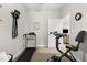 Well-lit exercise room featuring a treadmill and stationary bike equipment at 212 Orange St, Oxford, NC 27565