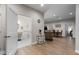 Bright hallway leading to multiple rooms, including a bathroom and dining area at 212 Orange St, Oxford, NC 27565