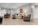 Spacious living room and dining area features wood-look flooring and an open layout, perfect for gatherings at 212 Orange St, Oxford, NC 27565