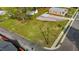 Expansive green yard featuring an outdoor seating area and a shed at 212 Orange St, Oxford, NC 27565