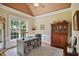 Cozy home office featuring a large window, custom built-ins, and ample workspace at 220 Lakecroft Pl, Fuquay Varina, NC 27526