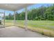 Screened porch offers serene views of the backyard and surrounding greenery, perfect for relaxing outdoors at 234 Robert Howe Dr, Fuquay Varina, NC 27526