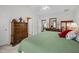 Well-lit bedroom with a ceiling fan and neutral carpet at 2424 Cambridge Rd, Burlington, NC 27215