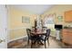 Eat-in dining area with chandelier and natural light at 2424 Cambridge Rd, Burlington, NC 27215