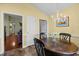 Eat-in dining area with views to entry hall and side entry at 2424 Cambridge Rd, Burlington, NC 27215