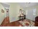 Bright entryway featuring hardwood floors, decorative furnishings, and access to other rooms at 2424 Cambridge Rd, Burlington, NC 27215