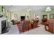 Expansive living room featuring vaulted ceiling, fireplace, and seamless transition to other areas at 2424 Cambridge Rd, Burlington, NC 27215