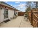 Exterior of home with patio, awning, outdoor furniture and landscaped yard at 2424 Cambridge Rd, Burlington, NC 27215