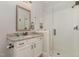 This bathroom boasts a glass-enclosed shower, vanity with granite counters, and modern fixtures at 251 Gentry Dr, Pittsboro, NC 27312