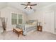 Cozy bedroom with plush carpet, neutral paint, and natural lighting at 251 Gentry Dr, Pittsboro, NC 27312